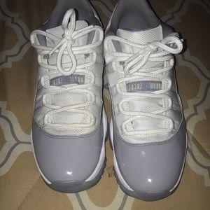 Grey and white low Jordan 11s need gone